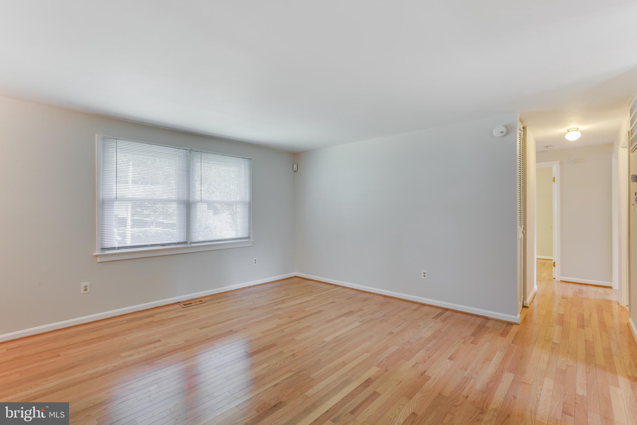 19064 Staleybridge Road Germantown, MD 20876 - Photo 5 of 37 Living Room (Double windows allow plenty of light)
