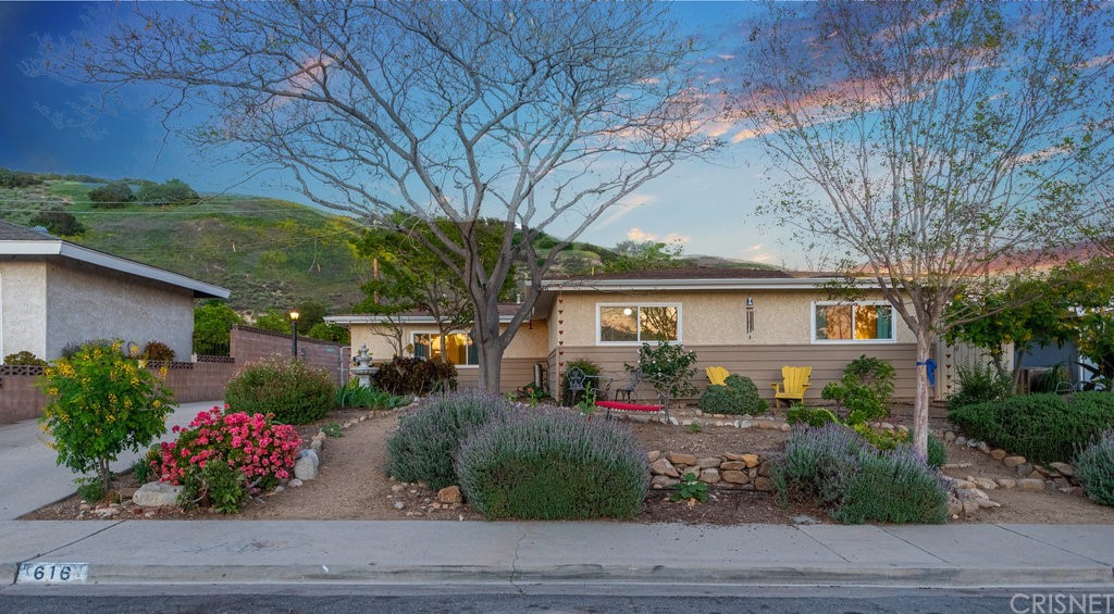 616 Island View Street Fillmore, CA 93015 - Photo 1 of 1 a front view of a house with a yard