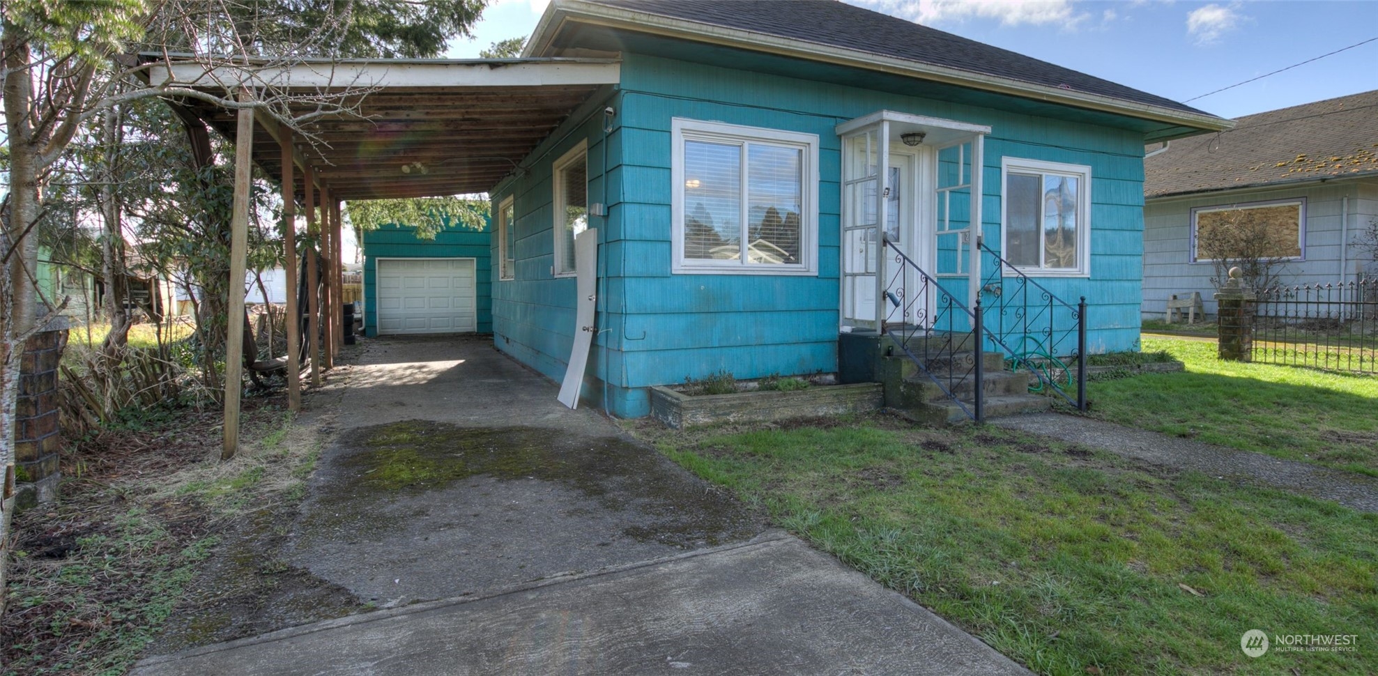 2205 West Second Street Aberdeen, WA 98520 - Photo 1 of 22 a view of a house with a backyard