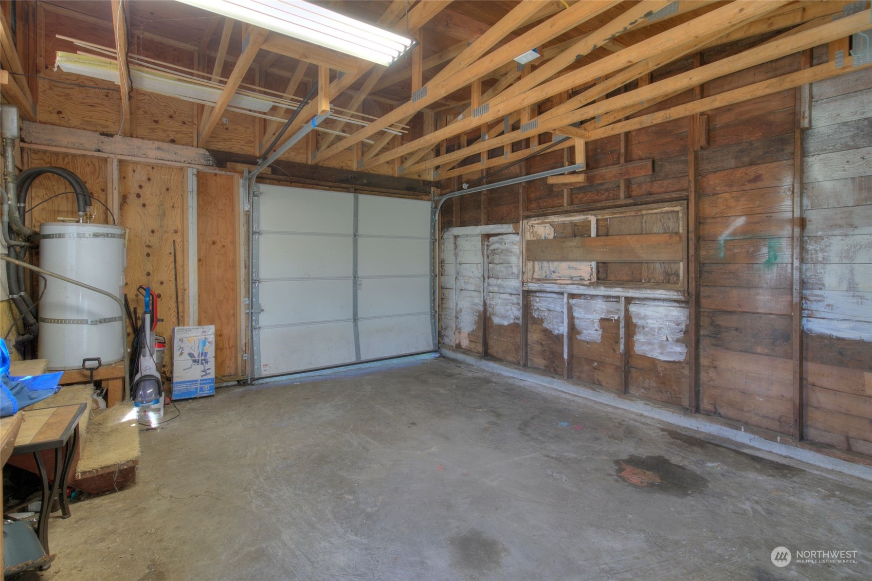 2205 West Second Street Aberdeen, WA 98520 - Photo 19 of 22 a view of empty room with wooden walls