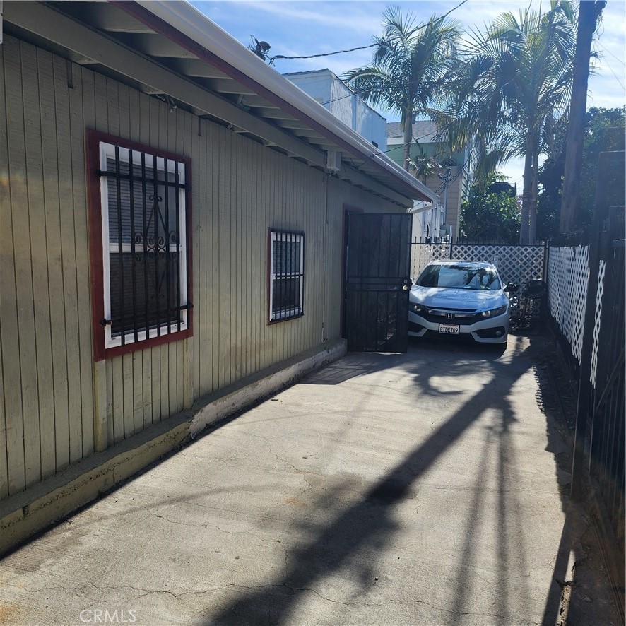1105 Cherry Avenue Long Beach, CA 90813 - Photo 4 of 13 a car parked in front of a house