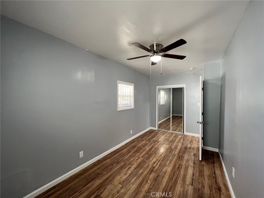1105 Cherry Avenue Long Beach, CA 90813 - Photo 9 of 13 wooden floor in an empty room with a window