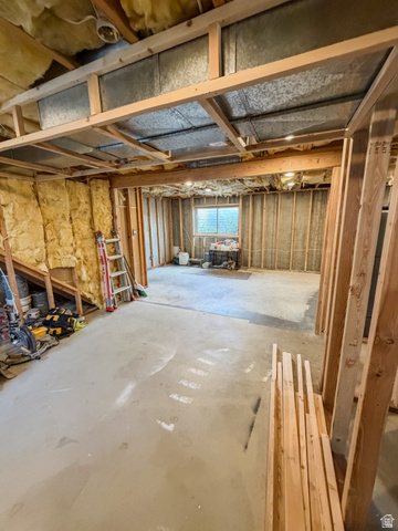 680 Timpie Road Tooele, UT 84074 - Photo 25 of 31 Unfinished lower level featuring exposed framing, concrete flooring, and a visible window opening