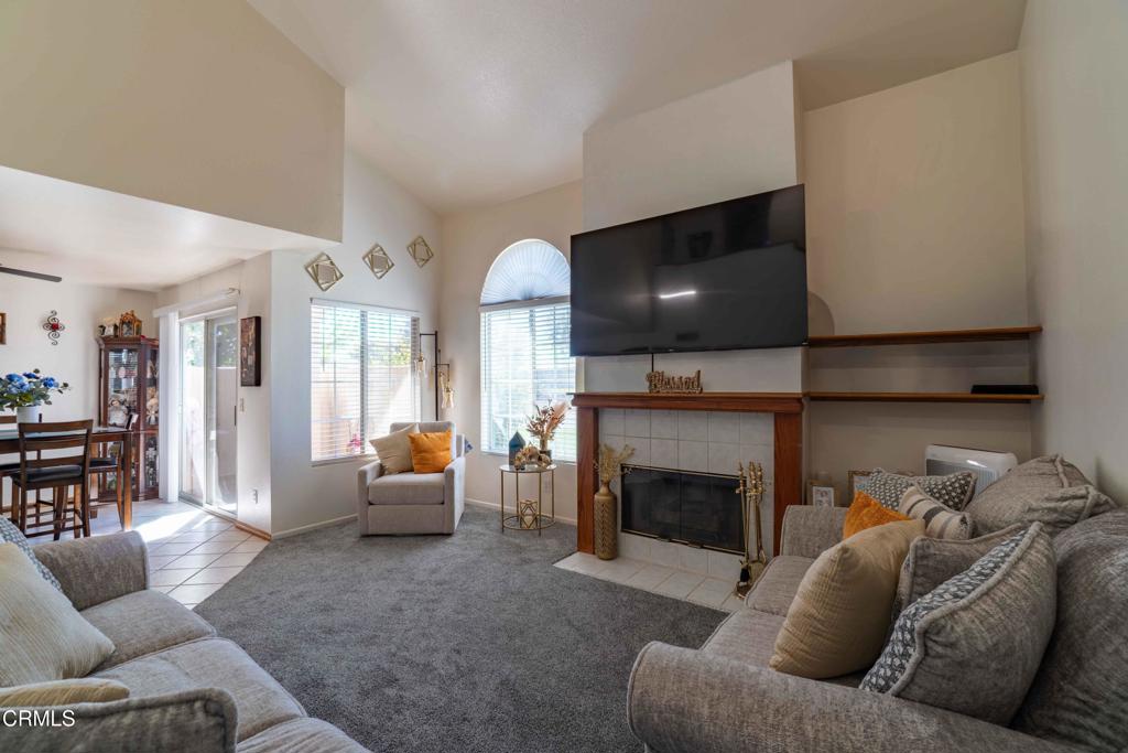 635 East Pleasant Valley Road Port Hueneme, CA 93041 - Photo 5 of 17 a living room with furniture and a fireplace