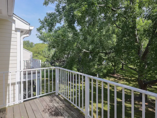 a view of a wooden roof deck