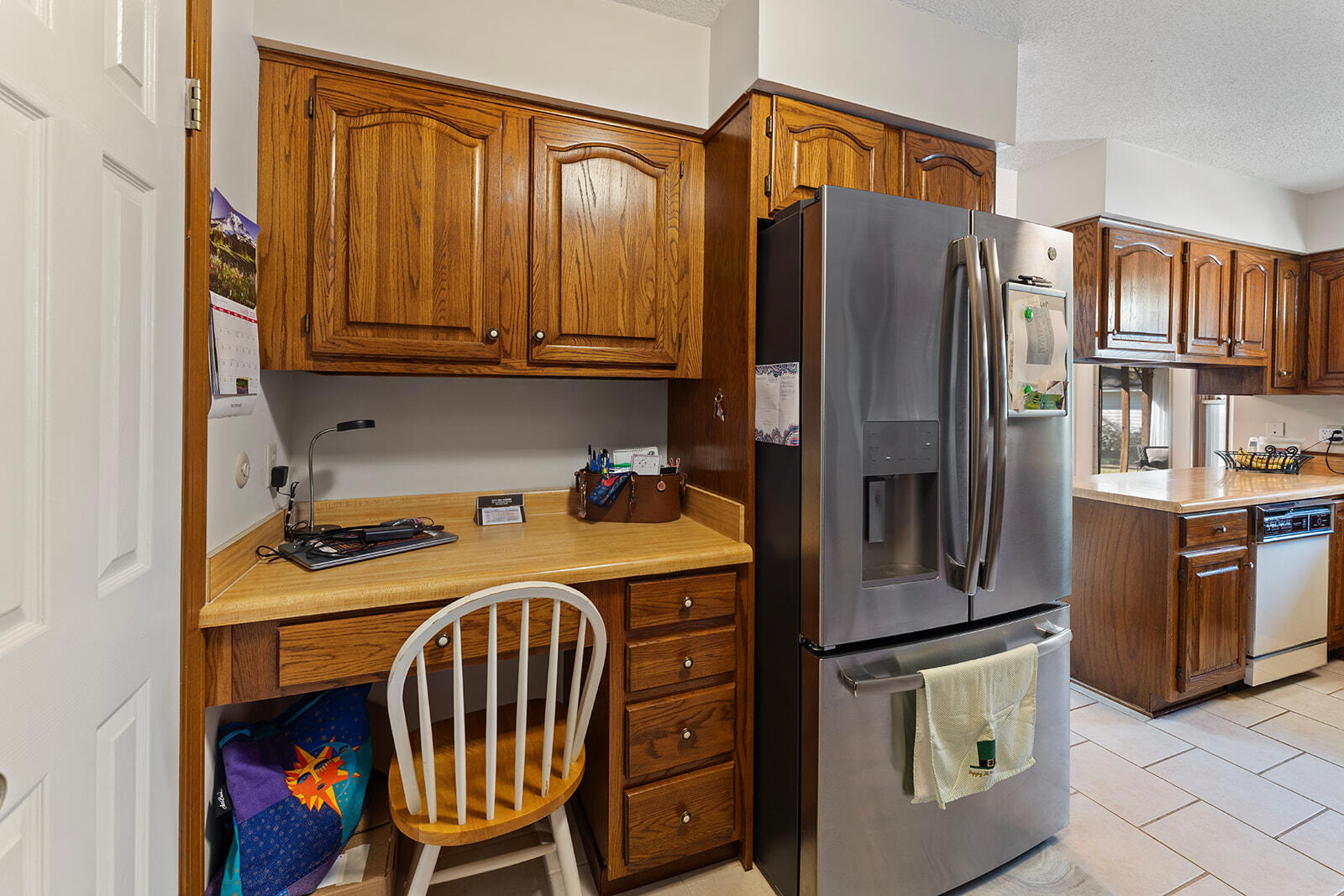 3687 Airport Road Crestview, FL 32539 - Photo 13 of 74 a kitchen with stainless steel appliances granite countertop a refrigerator a stove and a sink