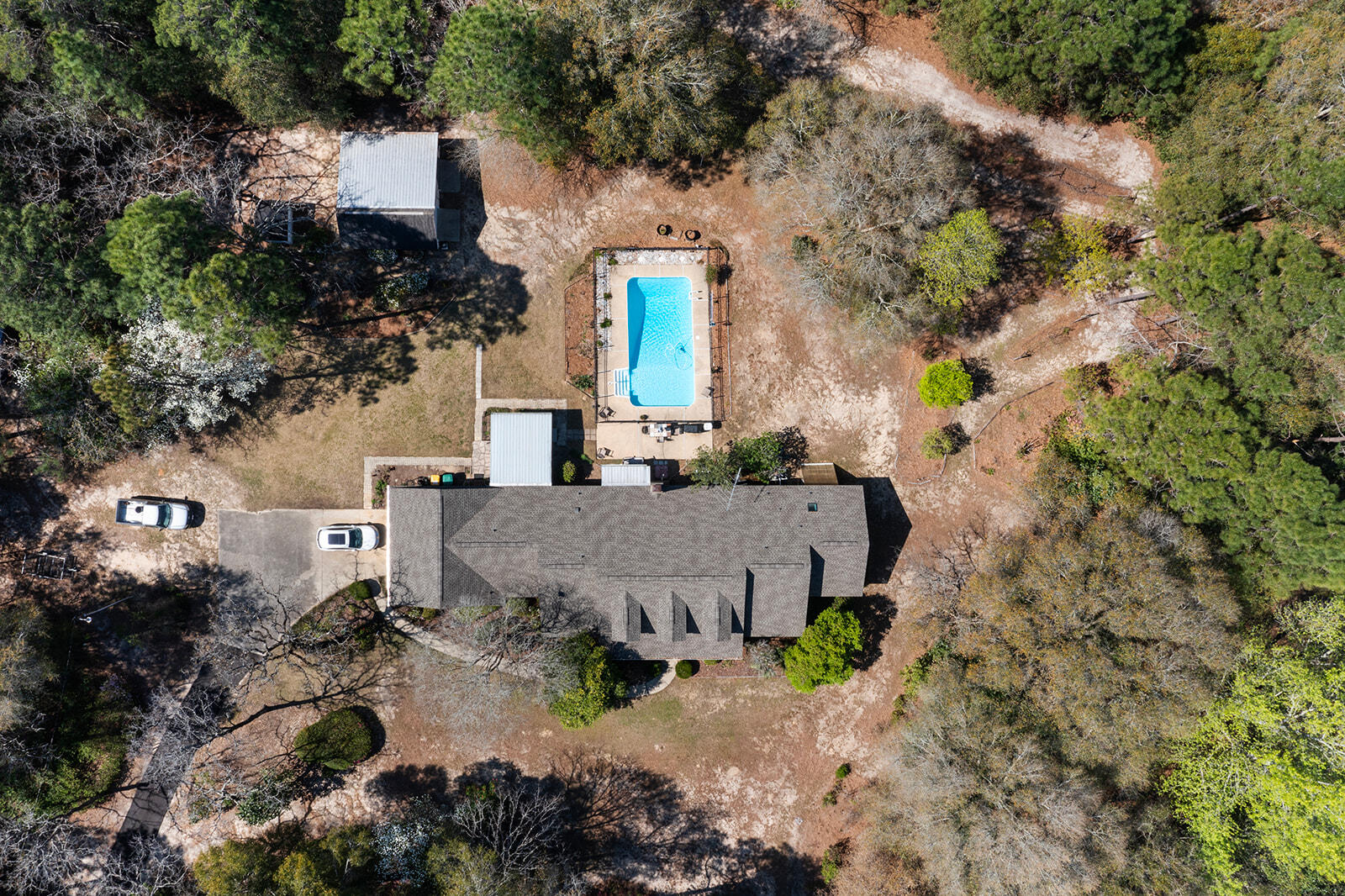 3687 Airport Road Crestview, FL 32539 - Photo 31 of 74 an aerial view of a house with a yard and large tree