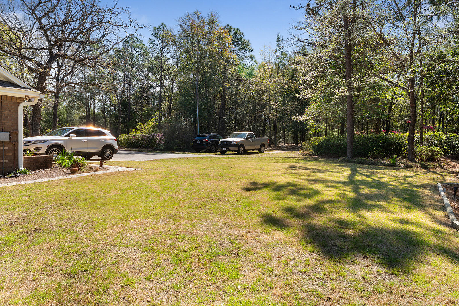 3687 Airport Road Crestview, FL 32539 - Photo 73 of 74 a view of a house with swimming pool and sitting area