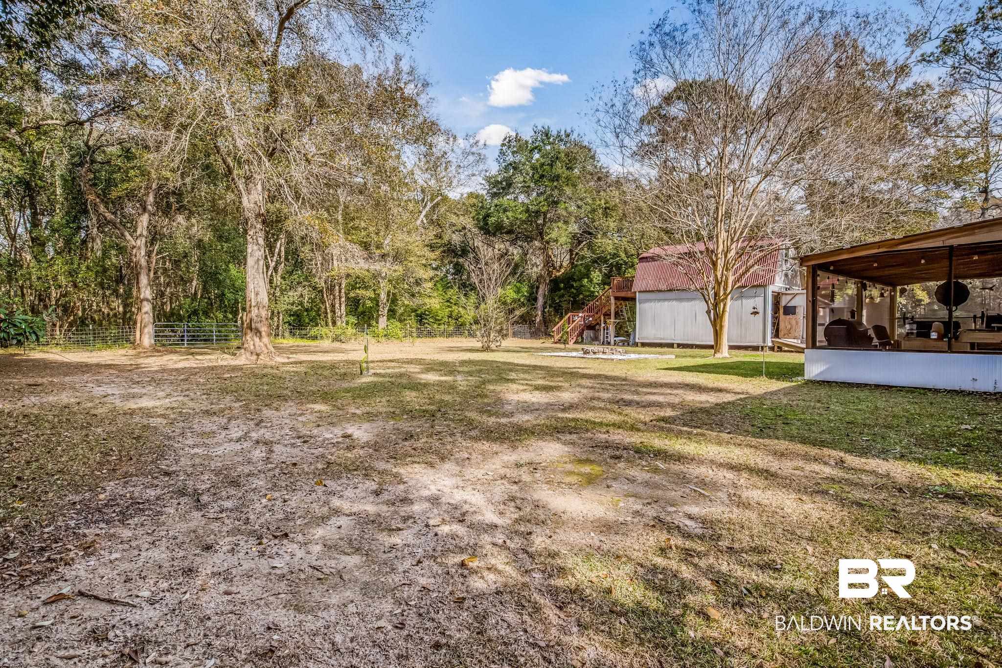 12199 Bay Road West Foley, AL 36535 - Photo 11 of 62 View of yard with an outbuilding