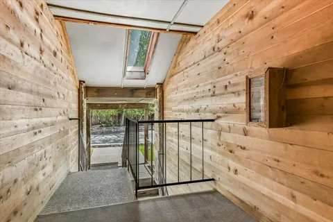 a view of entryway with wooden floor