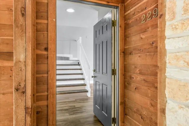 a view of a bathroom from the door