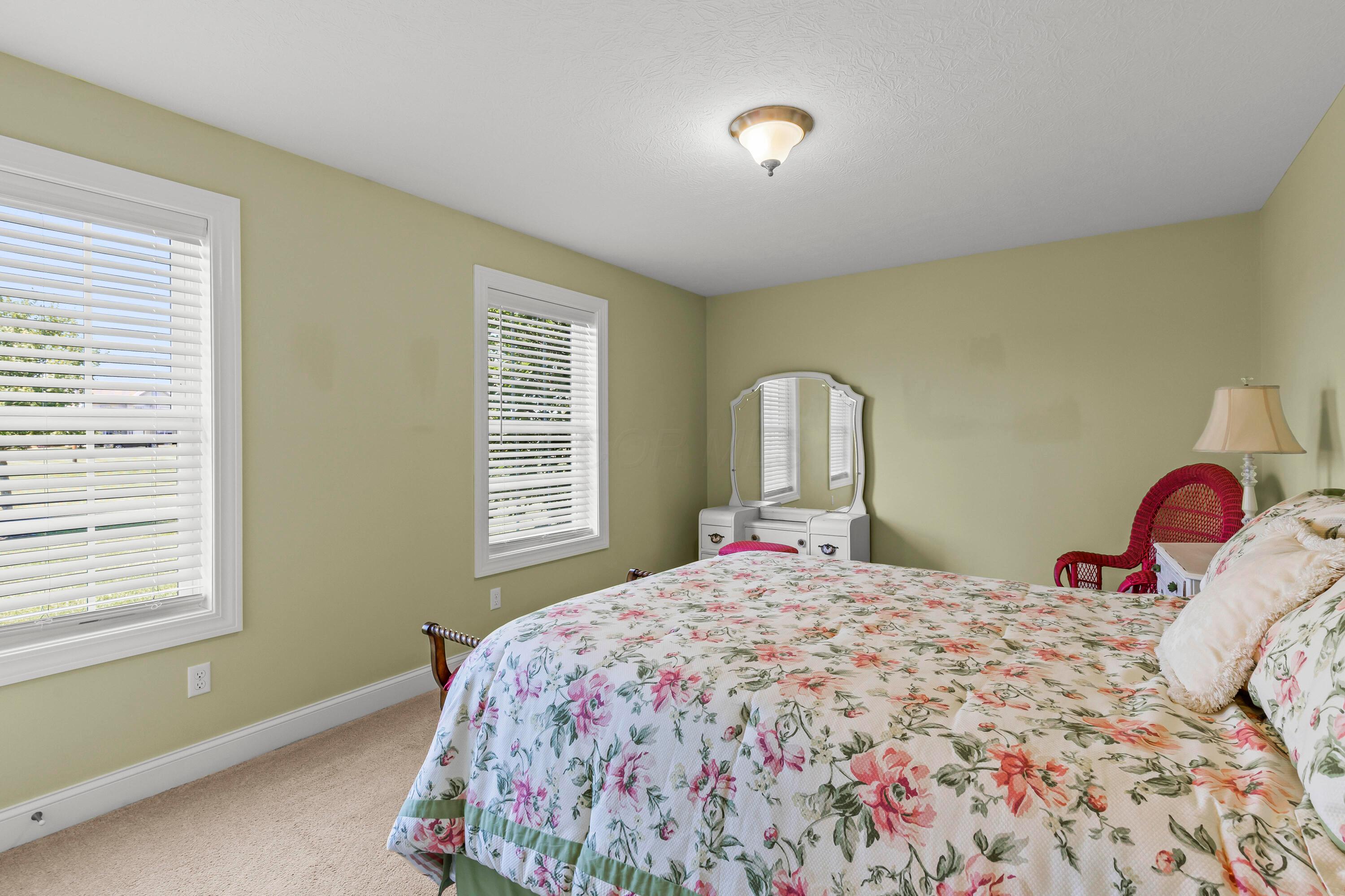 3582 Panhandle Road Delaware, OH 43015 - Photo 17 of 65 • Light sand carpet • Sage painted walls • Ceiling light • Lighted closet with (2) doors • Headboard does not remain • 2” blinds