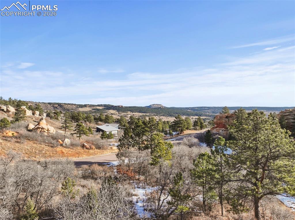 4549 Redstone Ridge Road Monument, CO 80132 - Photo 2 of 50 a view of a city with ocean view
