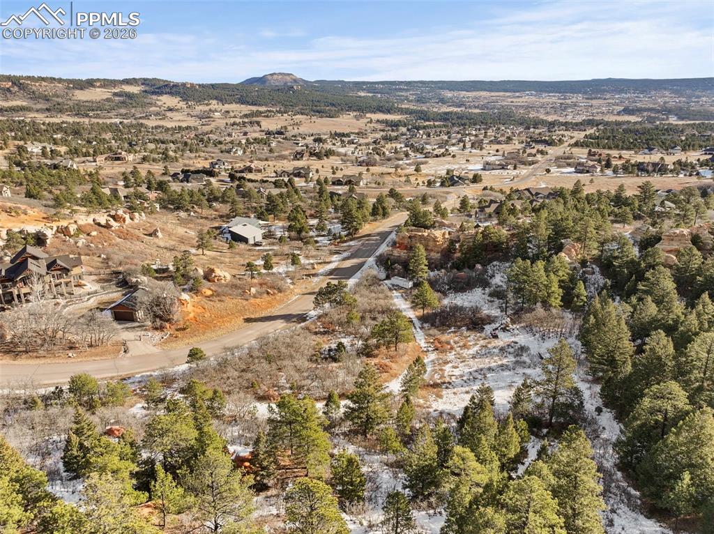 4549 Redstone Ridge Road Monument, CO 80132 - Photo 34 of 50 an aerial view of residential houses with outdoor space