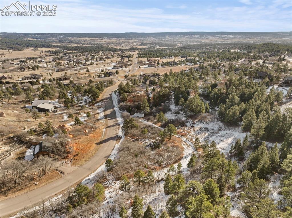 4549 Redstone Ridge Road Monument, CO 80132 - Photo 35 of 50 an aerial view of residential houses with outdoor space