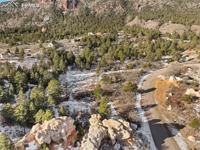 a view of a yard with a mountain