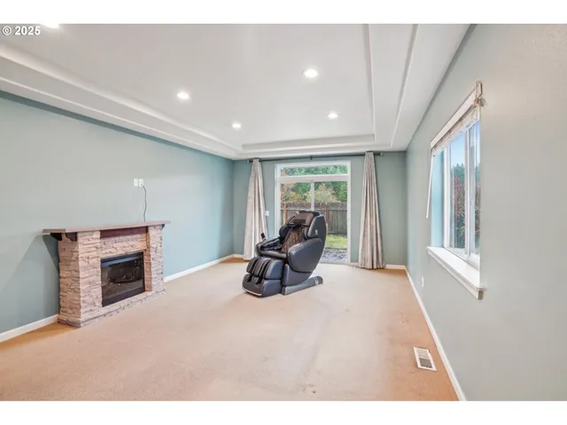 a bathroom with a granite countertop sink toilet a shower and a mirror