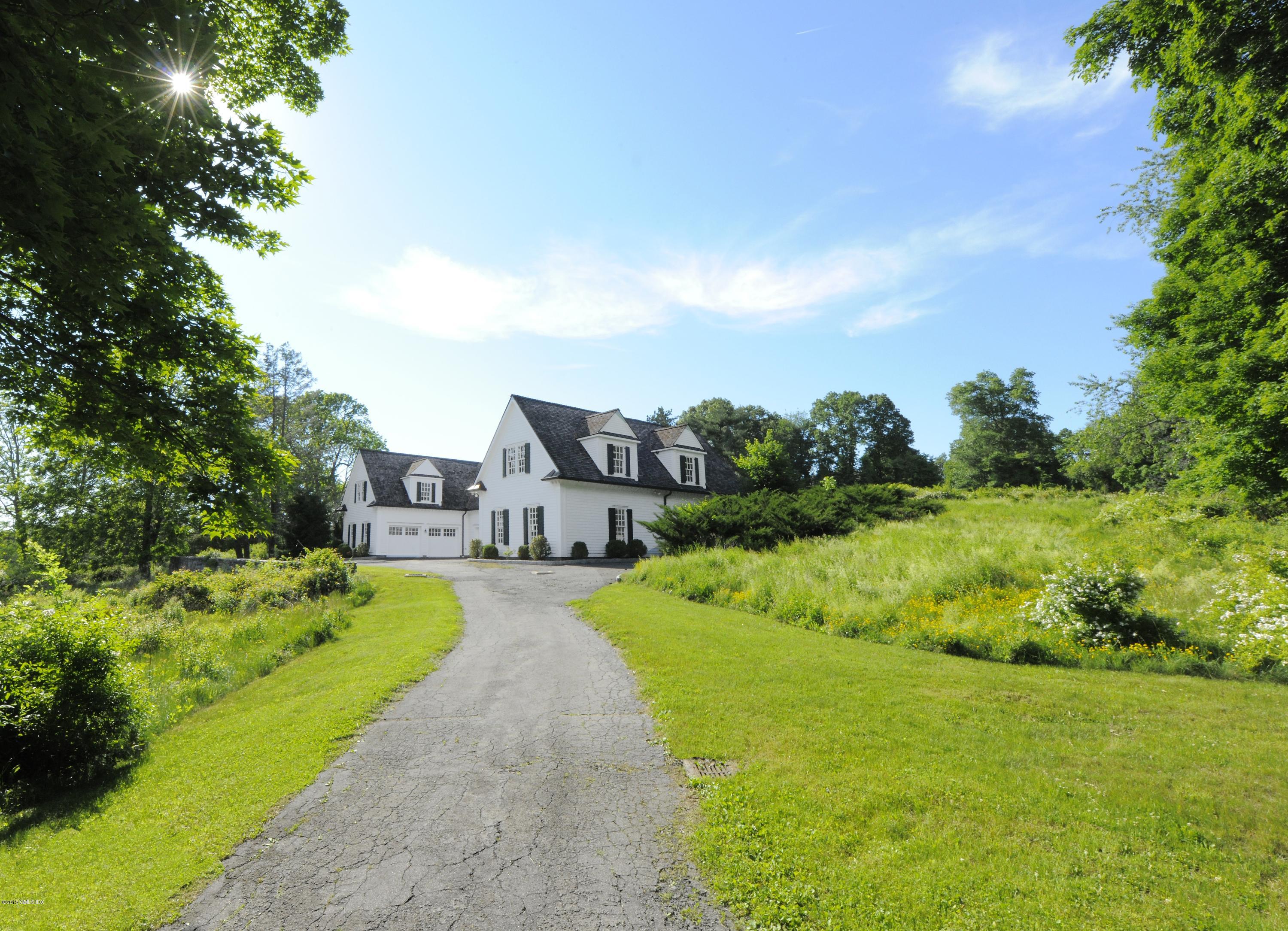 23 Cliffdale Road Greenwich, CT 06831 - Photo 12 of 24 a view of a garden with houses