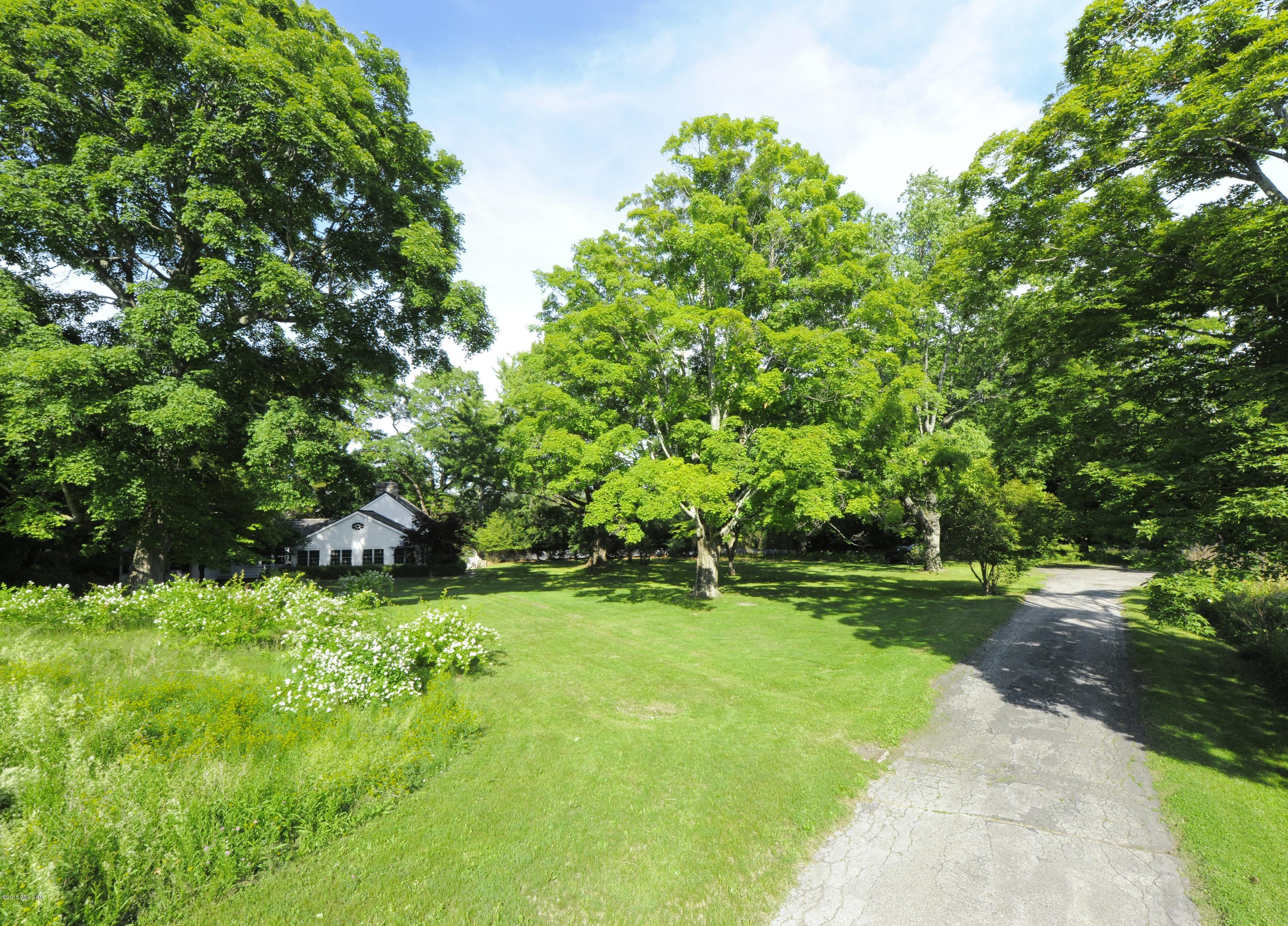 23 Cliffdale Road Greenwich, CT 06831 - Photo 16 of 24 a view of green field with trees in the background