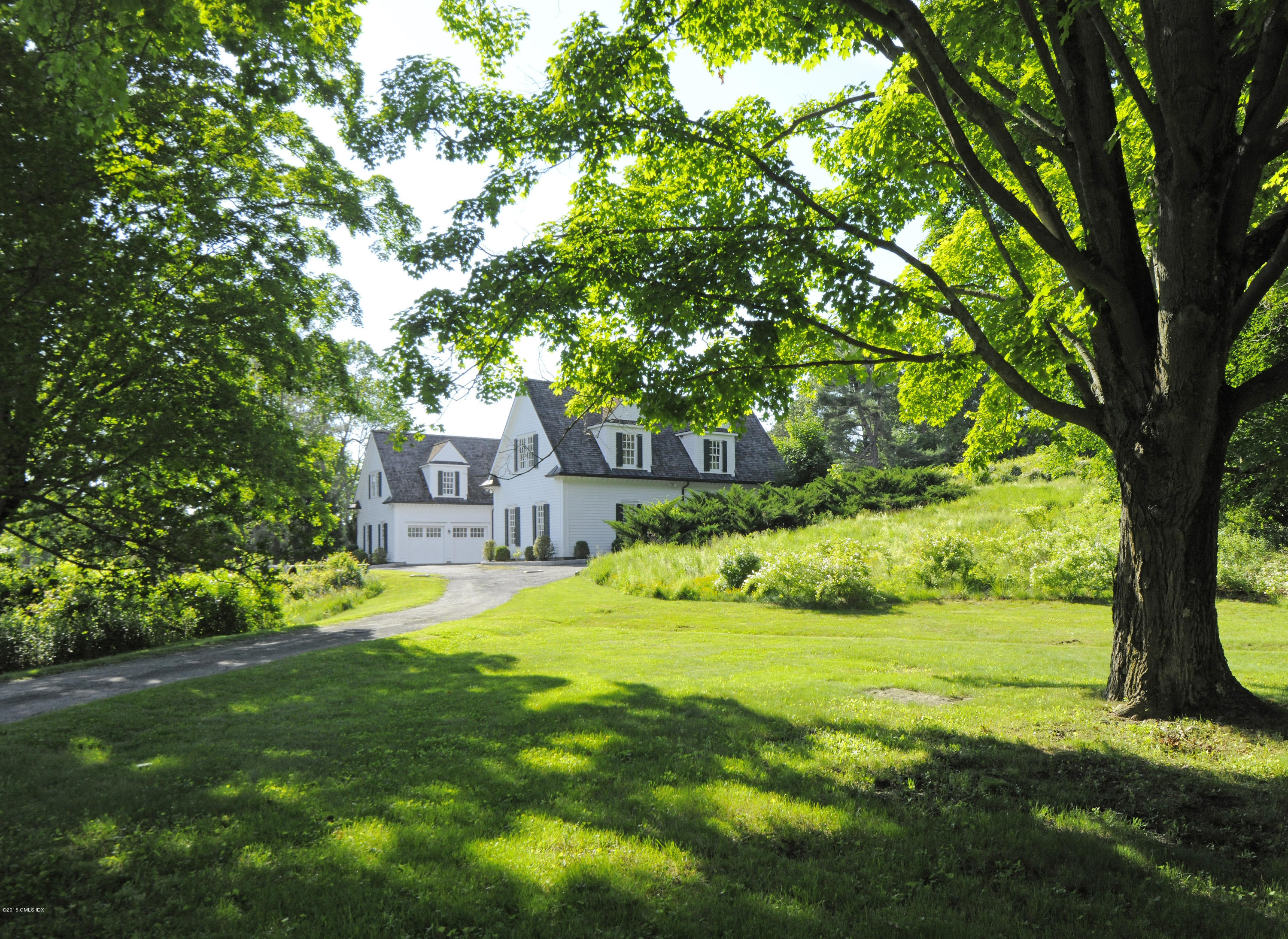 23 Cliffdale Road Greenwich, CT 06831 - Photo 4 of 24 a house view with a outdoor space
