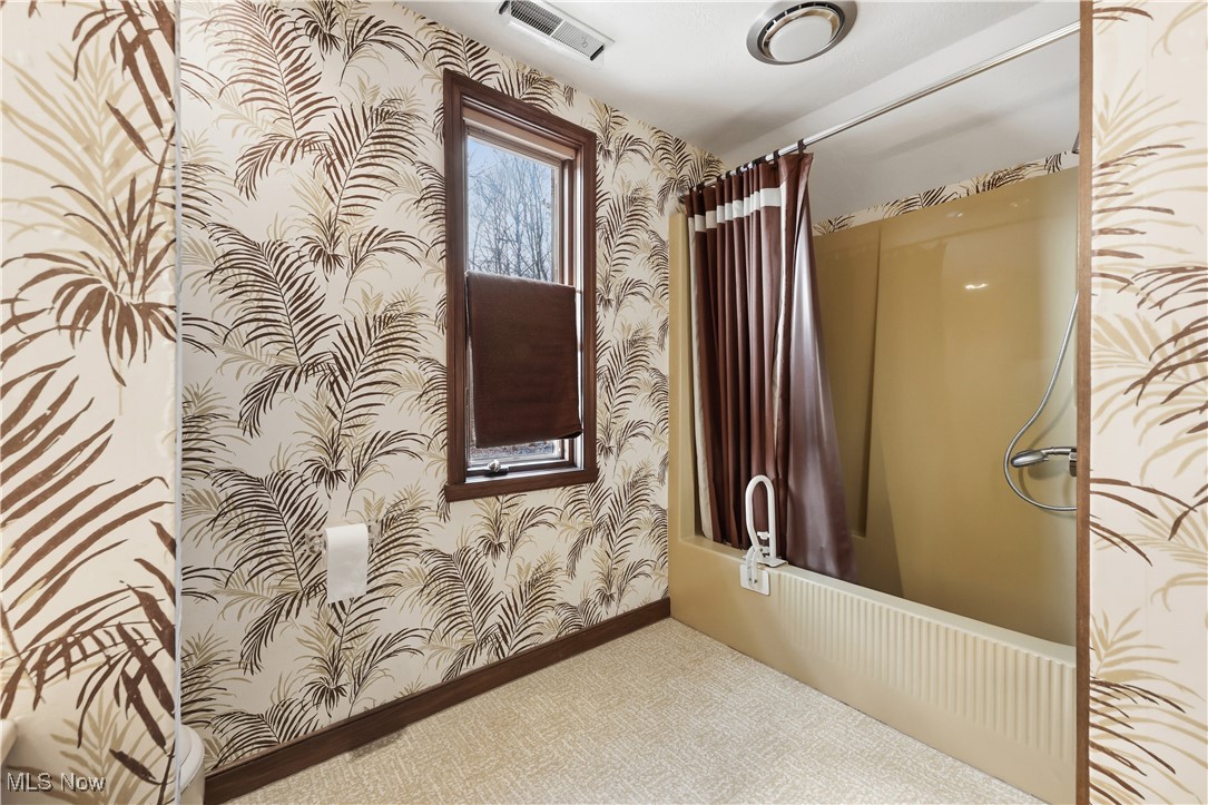 7014 River Styx Road Medina, OH 44256 - Photo 33 of 49 Hallway featuring wallpapered walls and carpet floors
