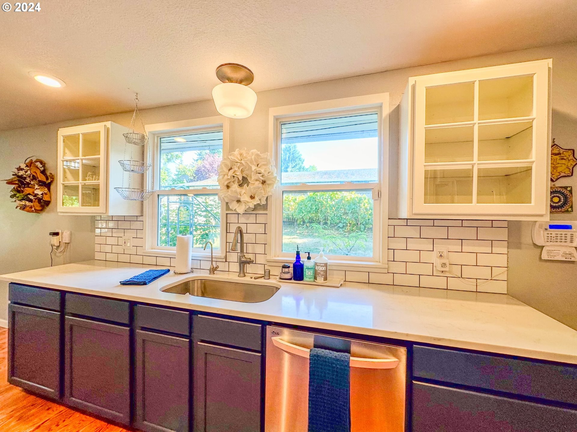 3010 R Street Vancouver, WA 98663 - Photo 13 of 43 a kitchen with a sink and a window