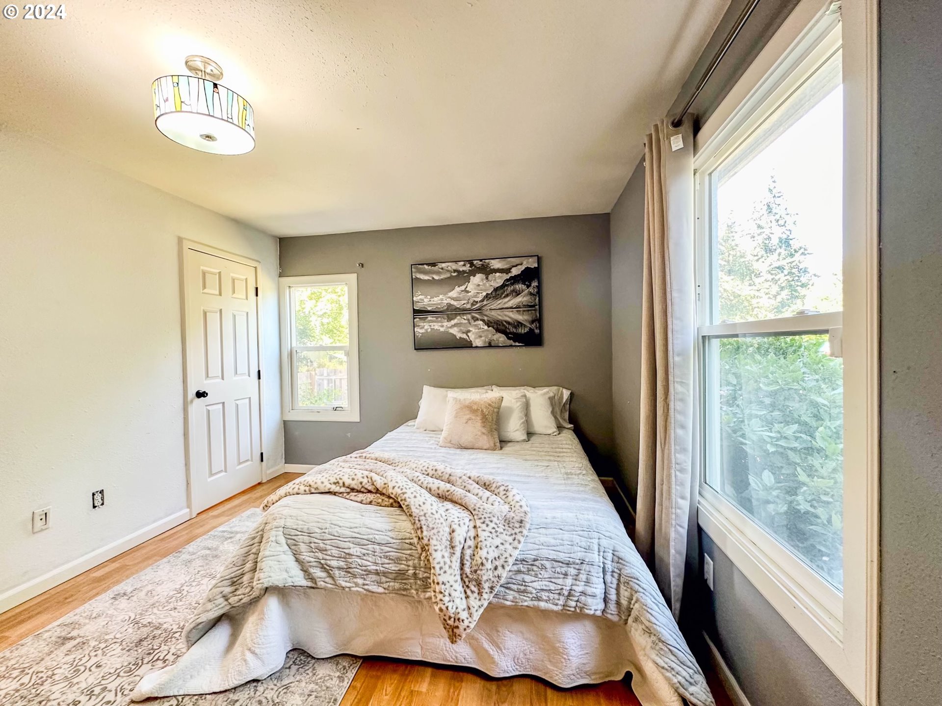 3010 R Street Vancouver, WA 98663 - Photo 23 of 43 a bedroom with a bed and a window