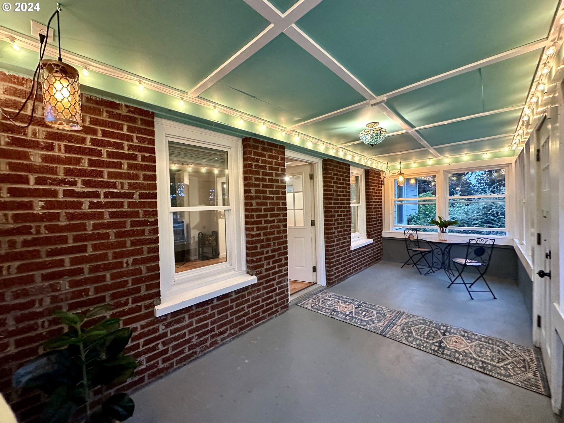 3010 R Street Vancouver, WA 98663 - Photo 5 of 43 a view of a porch with a table and chairs