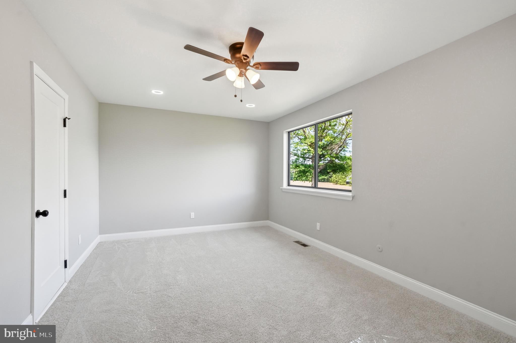 50 Centennial Road Telford, PA 18969 - Photo 9 of 21 Master bedroom with ensuite bathroom & ceiling fan