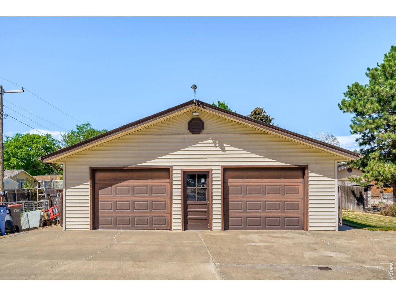 105 Maple Street Frederick, CO 80530 - Photo 4 of 29 Easily fit 2 cars, up to 4 in the detached garage