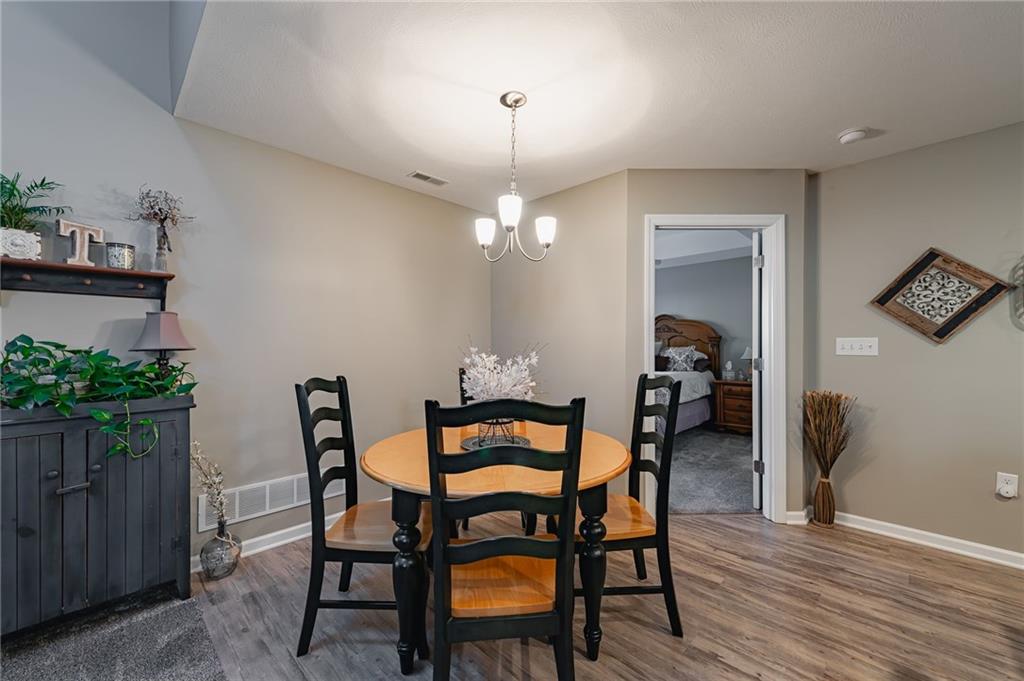424 Chestnut Lane Apollo, PA 15613 - Photo 11 of 33 a view of a dining room with furniture and wooden floor