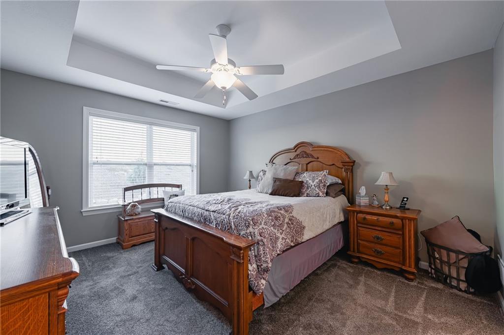 424 Chestnut Lane Apollo, PA 15613 - Photo 17 of 33 a bedroom with a bed and a chandelier