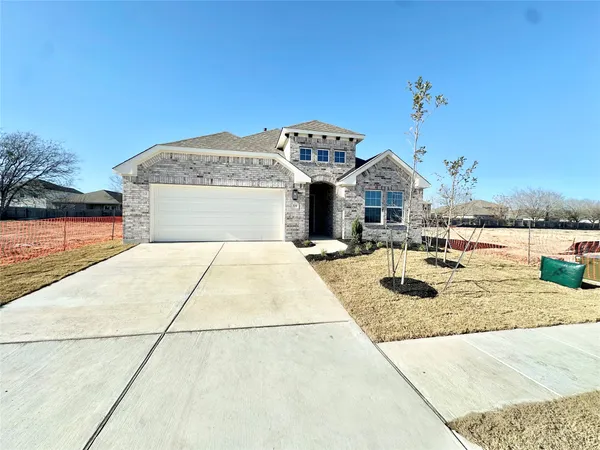 a view of a house with pool and yard