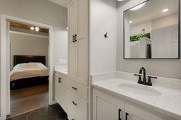 146 Hackney Trail Ellijay, GA 30536 - Photo 19 of 26 a en suite bathroom with a sink and mirror