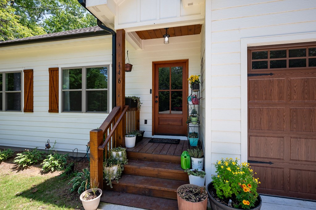 146 Hackney Trail Ellijay, GA 30536 - Photo 2 of 26 a front view of a house with a yard