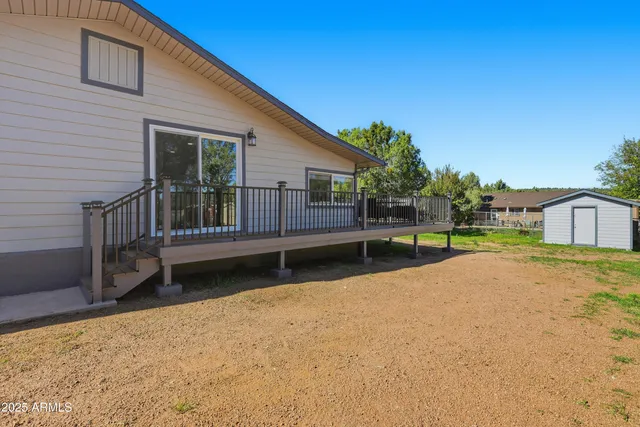 a view of a house with a swimming pool