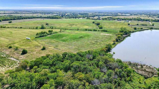 a view of an ocean and a mountain