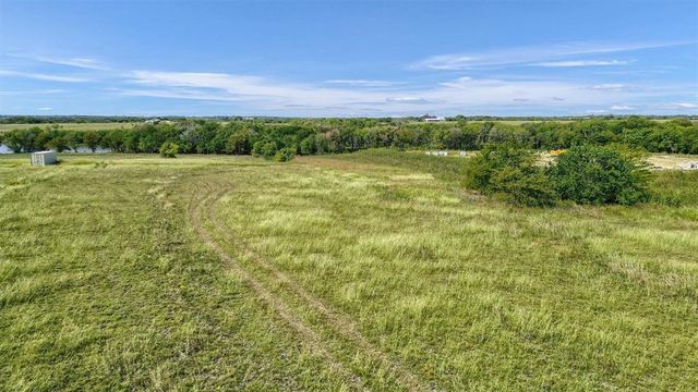 a view of a lake with a city