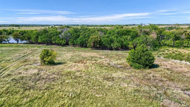 a view of a lake with a mountain