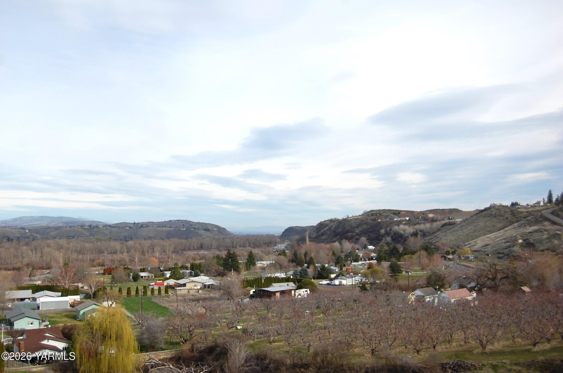 Nka Nka Naches Road South Yakima, WA 98908 - Photo 1 of 11 a view of a town with mountains in the background