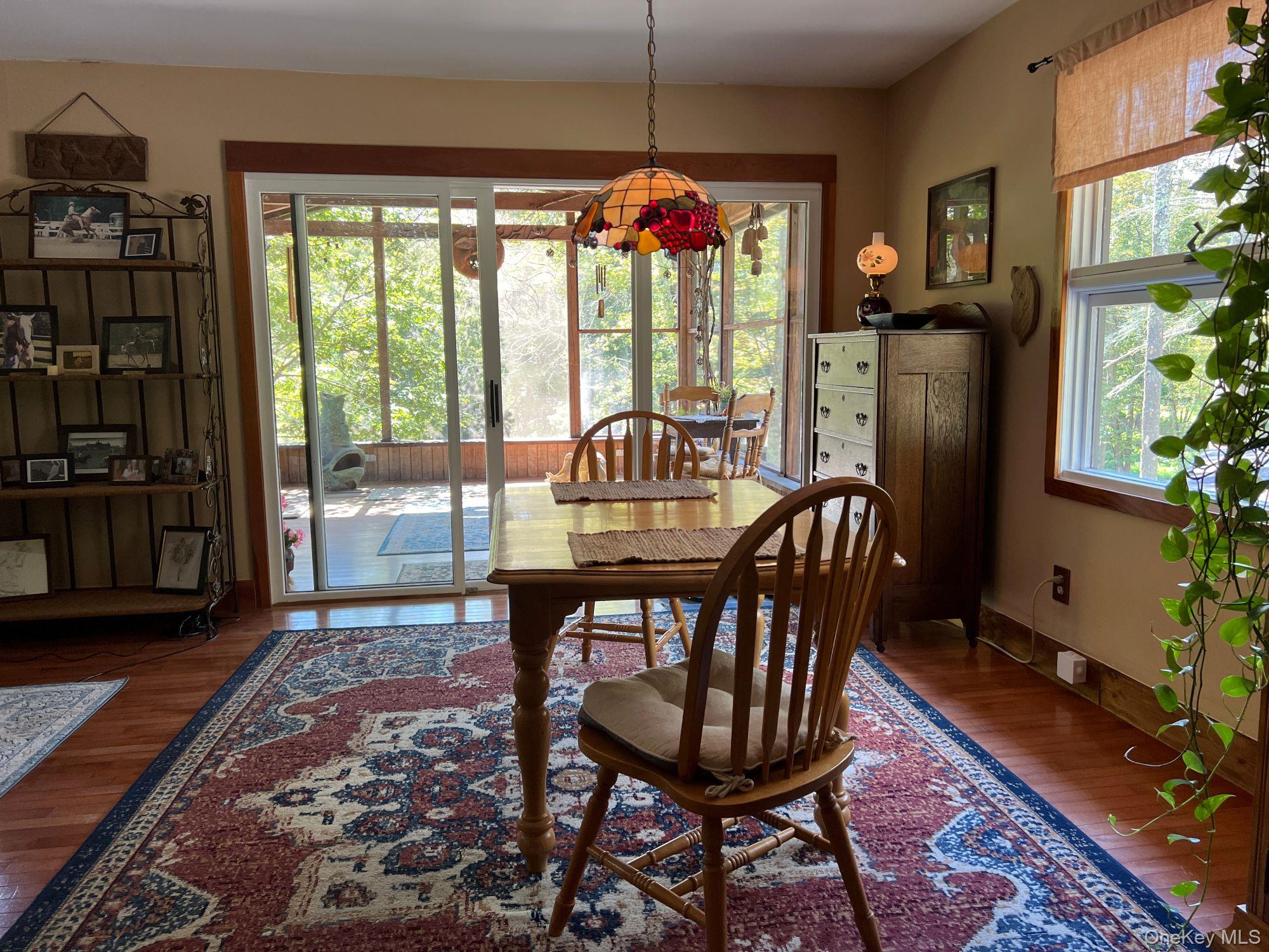 404 John Joy Road Saugerties, NY 12477 - Photo 11 of 50 a view of a dining room with furniture window and outside view