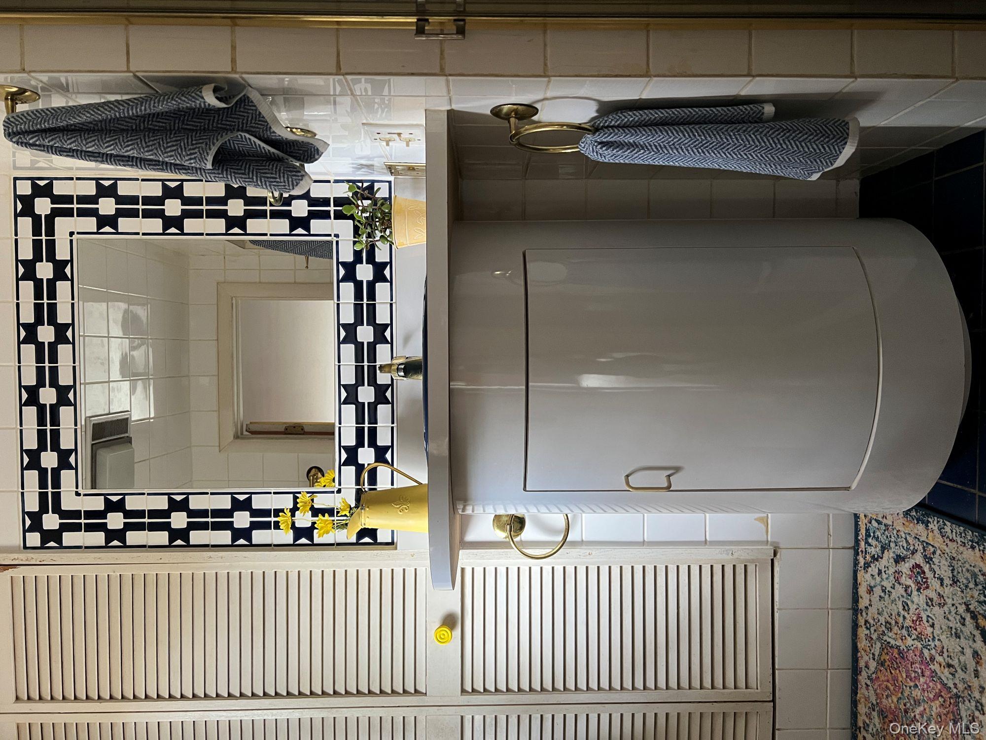 404 John Joy Road Saugerties, NY 12477 - Photo 18 of 50 a bathroom with a sink and a mirror