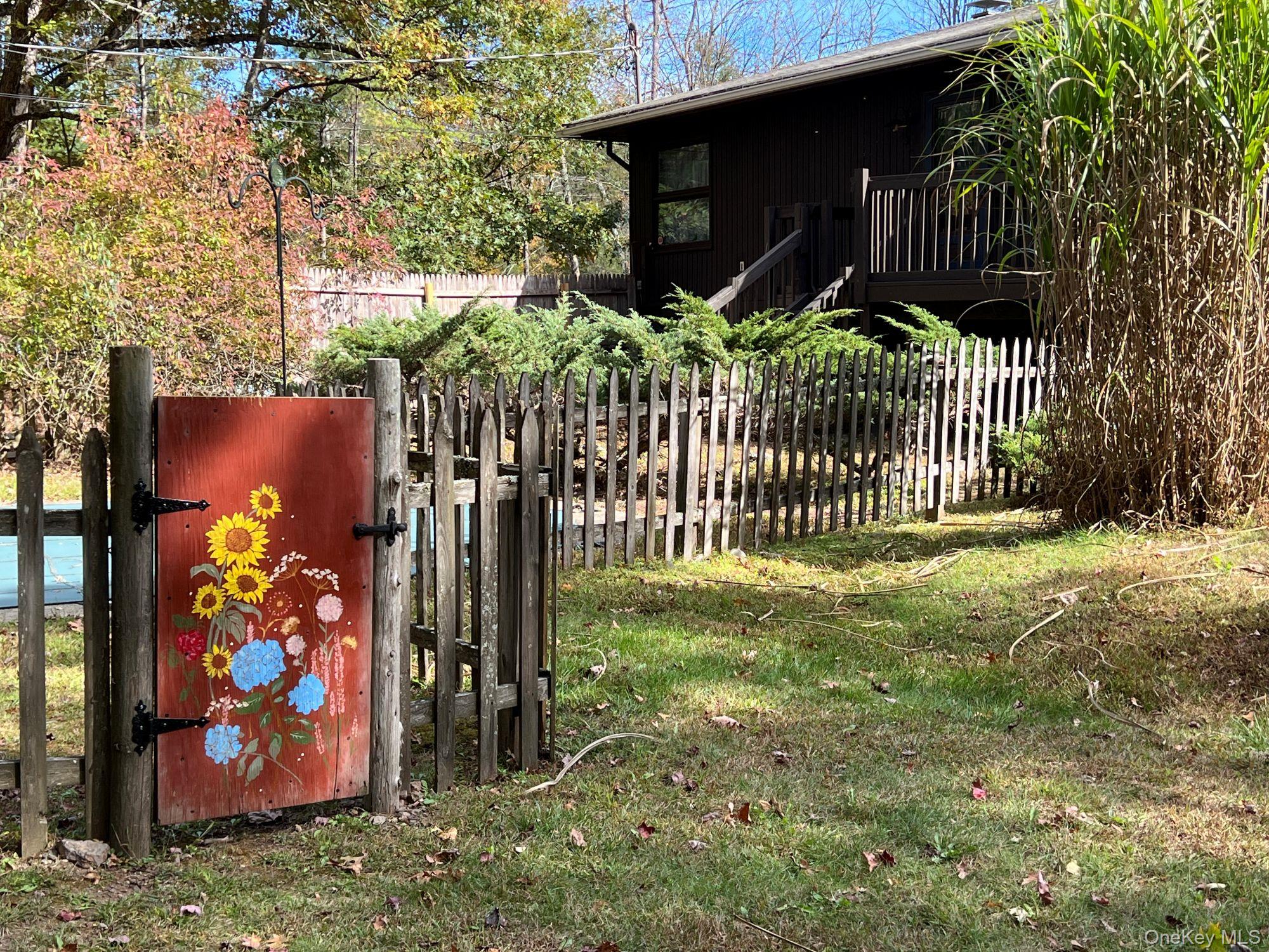 404 John Joy Road Saugerties, NY 12477 - Photo 32 of 50 a front view of a house with a yard swing