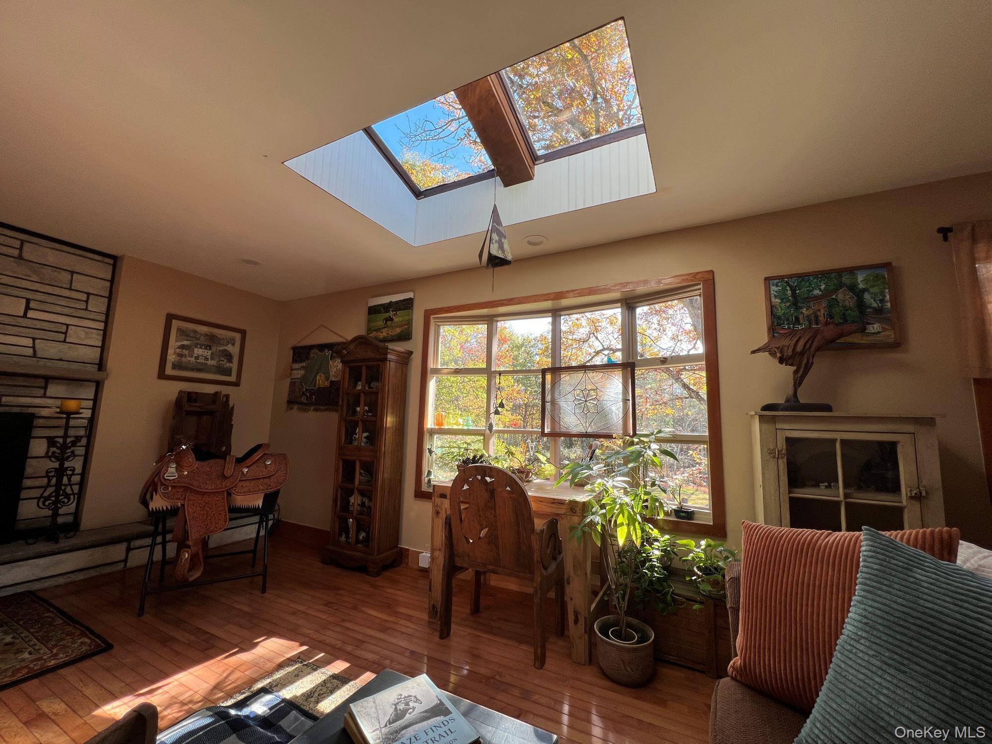 404 John Joy Road Saugerties, NY 12477 - Photo 8 of 50 a living room with furniture and a fireplace