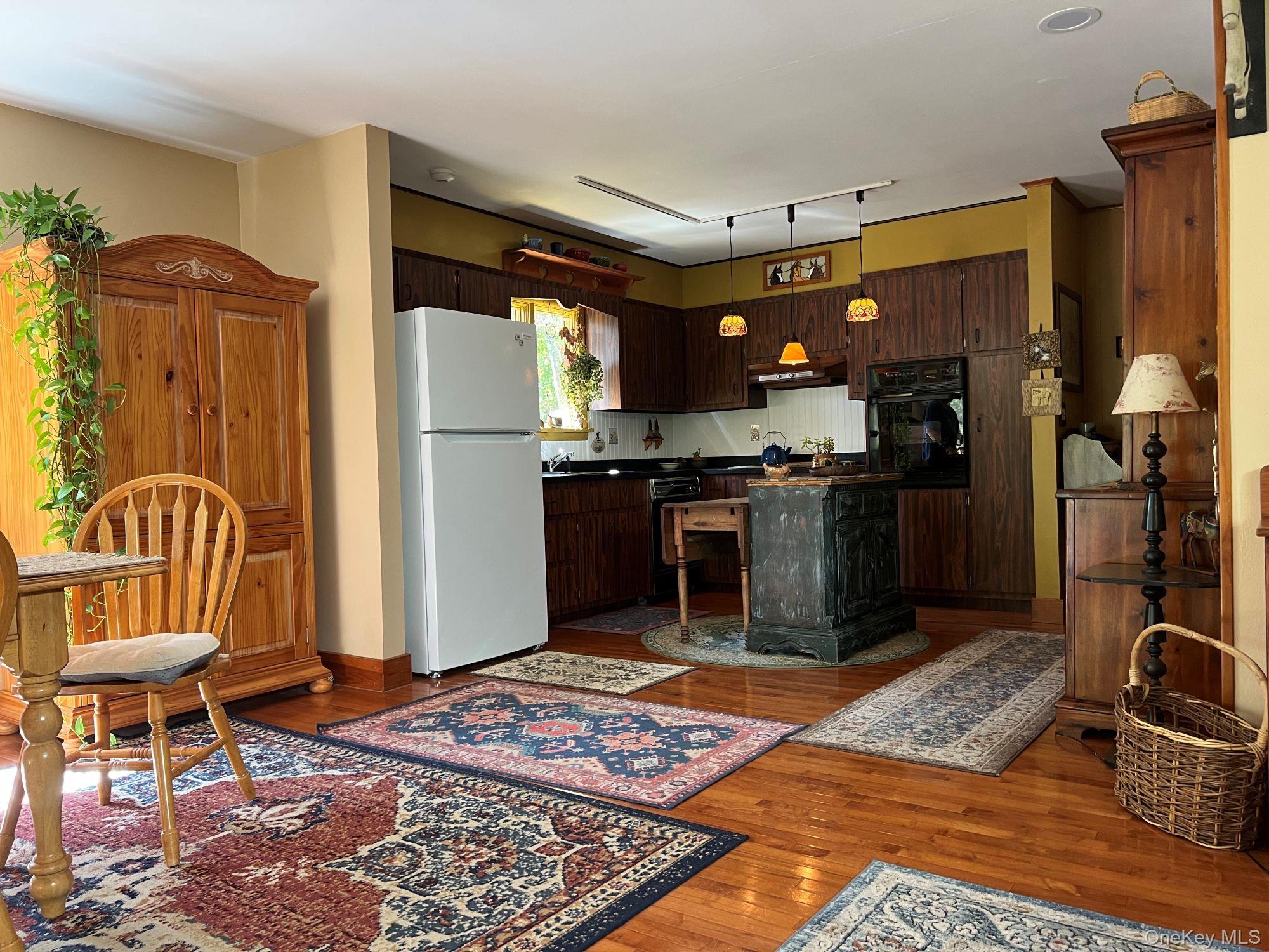 404 John Joy Road Saugerties, NY 12477 - Photo 10 of 50 a kitchen with stainless steel appliances granite countertop a refrigerator and a stove top oven