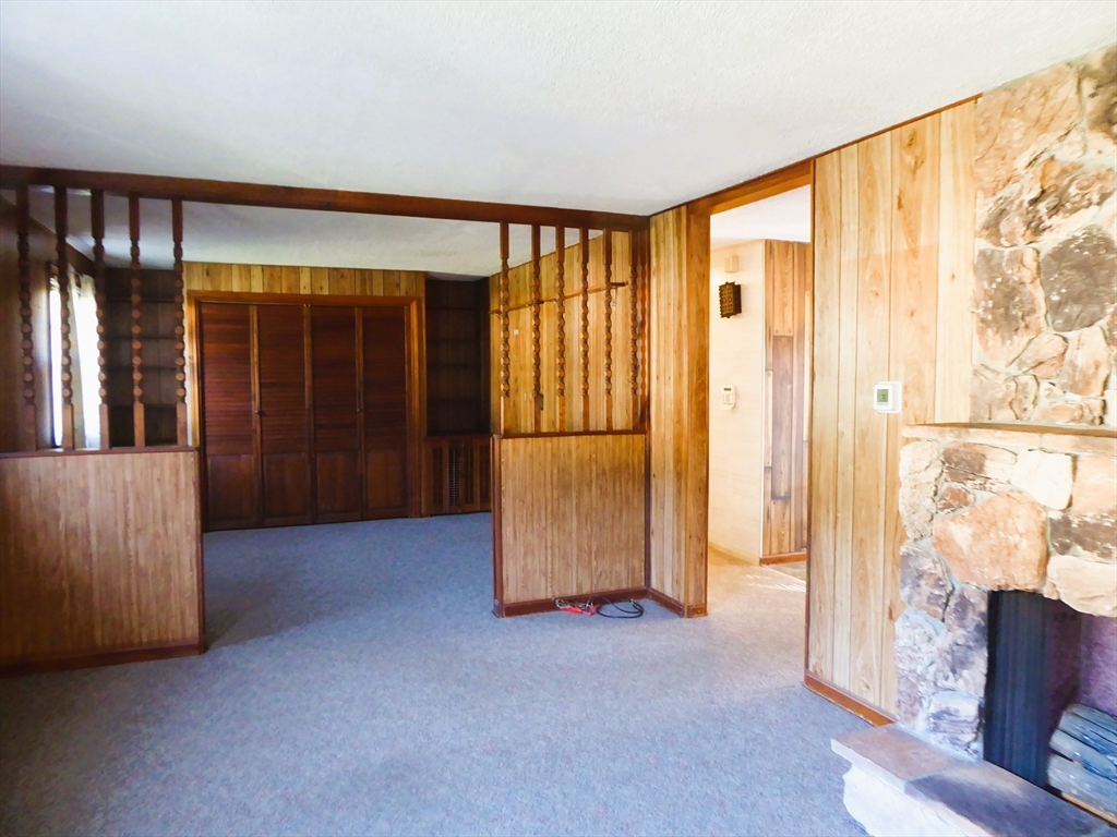 12 Gordon Drive Holyoke, MA 01040 - Photo 11 of 33 wooden floor in an empty room with a window