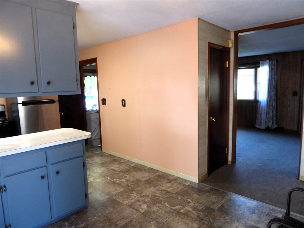 12 Gordon Drive Holyoke, MA 01040 - Photo 5 of 33 a kitchen with a refrigerator and window