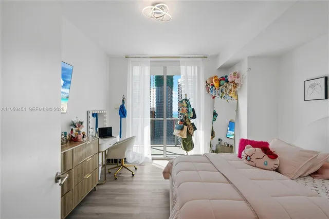 a bedroom with furniture and a couch