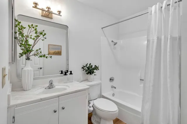 a utility room with sink dryer and washer
