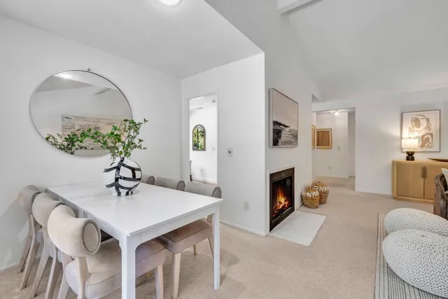 a view of a livingroom with furniture and a fireplace